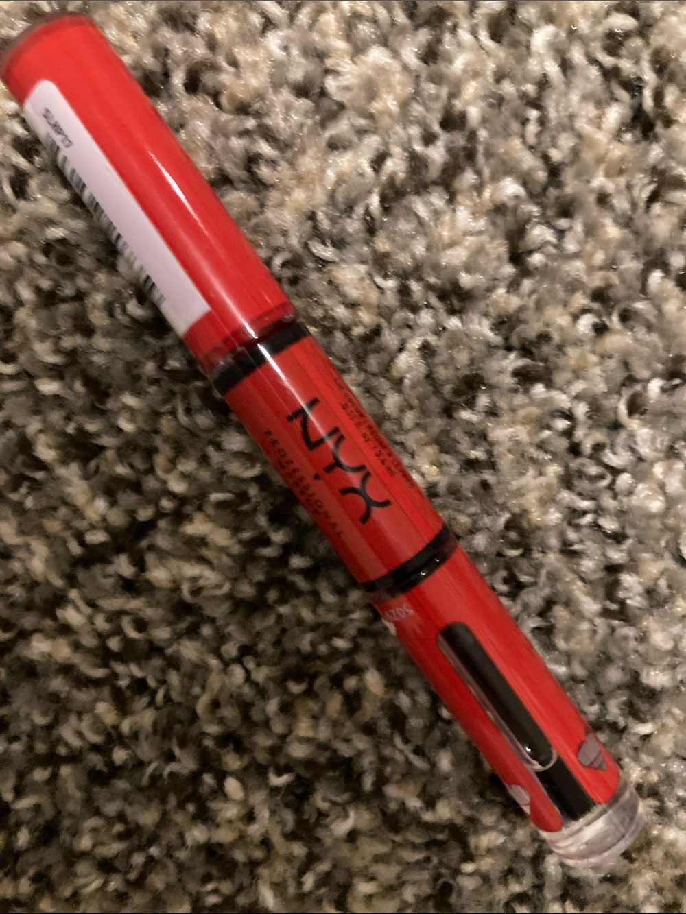 NYX professional makeup Shilo, rebel in red lipstick and gloves